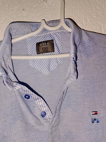 Majice: Muške polo majice – 2 komada Svaka majca po 600dinara 1) Infinity Man — 6