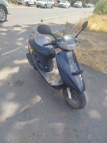 сколько стоит электрический мотоцикл: Скутер Honda, 50 куб. см, Бензин, Б/у
