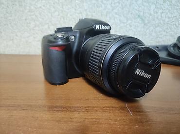 nikon d100: Ideal fotoparatdi cox ucuza satiram diger d3100 lerin qiymetini gore — 2