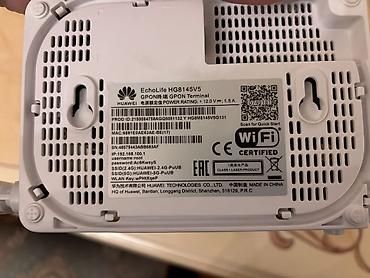 huaweı modem: Huawei EchoLife HG8145V5 GPON Wi‑Fi router. Wi‑Fi: 2.4 GHz və 5 GHz — 2