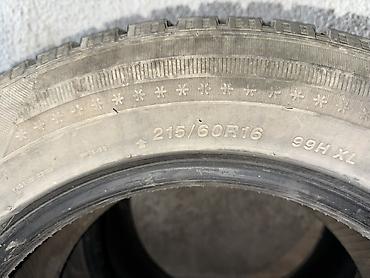 зимние шины 2056016: Комплект из 4 автомобильных шин Goodyear. Размер: 215/60 R16 — 2