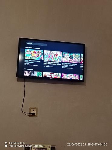 Samsung divar tipli Smart TV - Ekran: təqribən 82 diyaqnal 4 5 ayin