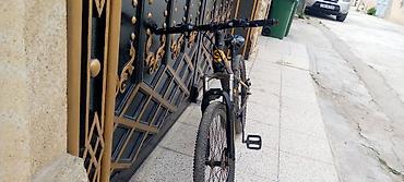Velosipedlər: Dağ velosipedi – 26” təkərli - Çərçivə: Alüminium, qara-sarı dizayn - — 8