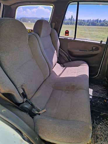 рул: Kia Sportage: 2000 г., Кол менен иштөөчү, Бензин, Жол тандабас — 2