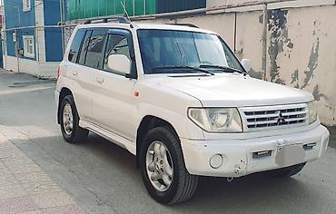 pajero tekeri: Mitsubishi Pajero iO 4WD – ağ rəngli, kompakt off-road SUV Maşına — 2
