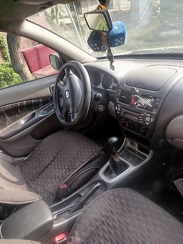 водный банан: Nissan Almera Tino: 2002 г., 2.2 л, Хэтчбэк — 5