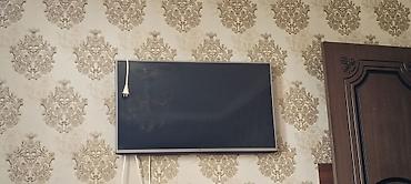 tv box android 10: Divar tipli LED televizor - Ekran: təxminən 32–40 düym ölçülü, nazik — 1
