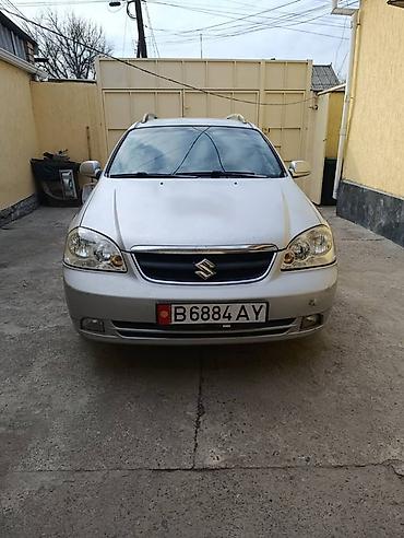 Suzuki: Suzuki Forenza / Reno: 2006 г., 2 л, Автомат, Газ, Универсал — 1