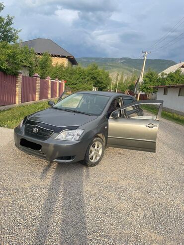 белорус 82 1: Toyota Corolla: 2003 г., 1.4 л, Механика, Бензин, Хетчбек