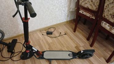 elektrikli sukuter: Toklu skuter zaryatka ile.isleyir 2 ay surulub hec bir problemi