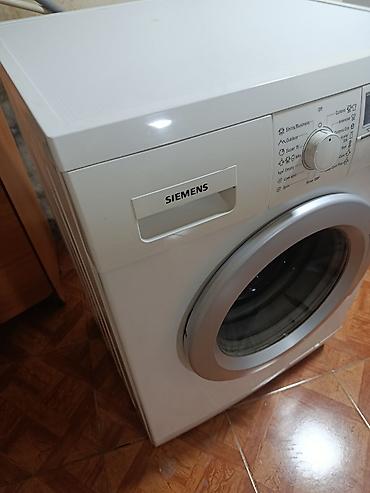 Məişət texnikası: Siemens önyükləməli paltaryuyan maşın - Baraban tutumu: 7 kq - Sürət — 3