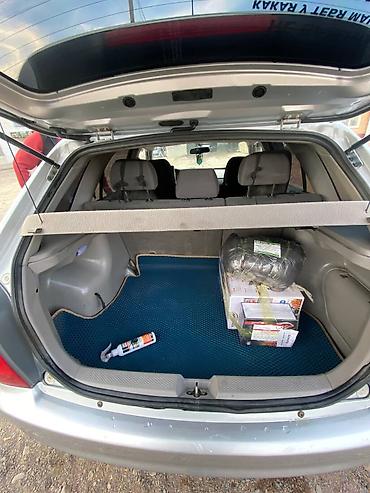 передвижные дома: Mazda Familia: 2001 г., Бензин, Хэтчбэк — 5