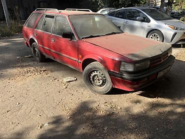 h 100: Nissan Bluebird: 1987 г., 2 л, Механика, Бензин, Универсал — 1
