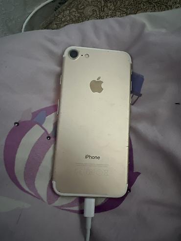 Мобильные телефоны: IPhone 7, 128 ГБ, цвет Gold Характеристики и особенности: - Память — 2