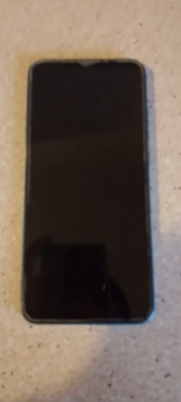 telefon ehtiyat hisselerinin sifarisi: Xiaomi Redmi 9A, 2 GB, rəng - Göy, 
 Sensor, Barmaq izi, İki sim kartlı