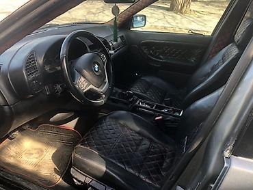 bmw lip: BMW 3 Series E36 sedan – tünd boz rəngdə, klassik kuzov xəttləri ilə — 5