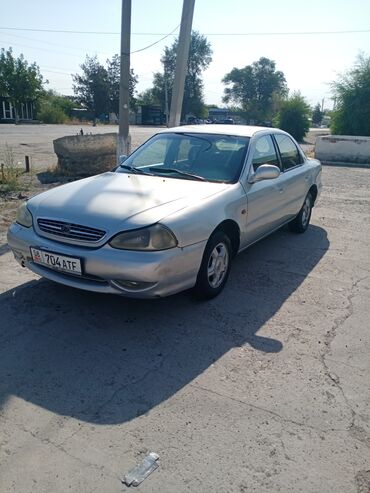 малибу диски: Kia Clarus: 1998 г., 1.8 л, Механика, Бензин, Седан