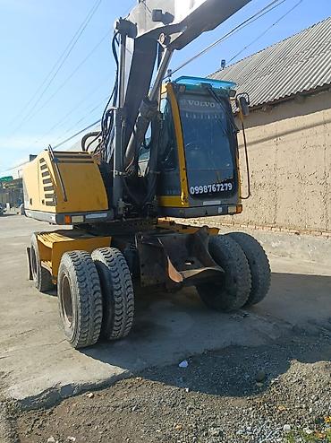 фрезер е26: Экскаватор, Volvo, 2004 г., Колесный — 2