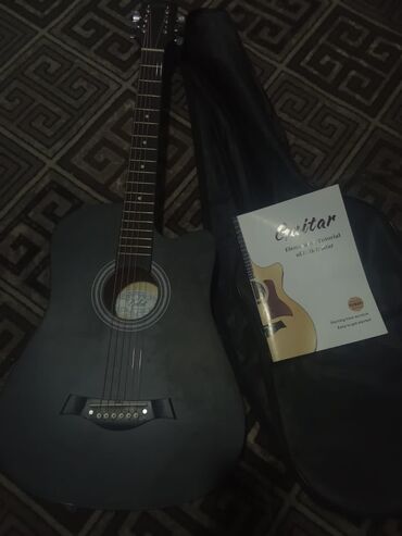 купить укулеле недорого: Акустическая гитара dreadnought в чёрном матовом цвете. Корпус at lalafo.kg купить укулеле недорого: Акустическая гитара dreadnought в чёрном матовом цвете. Корпус