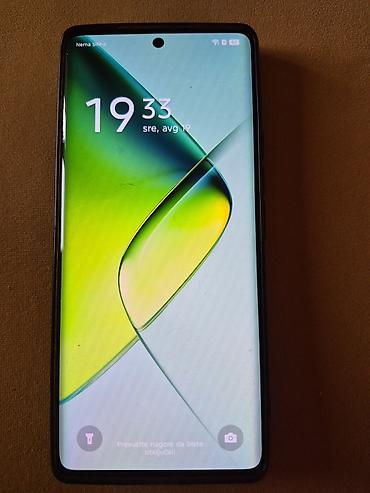 trimer igracka cena: Infinix Note 40 Pro,star manje od dve godine. Zelena pozadina od — 3