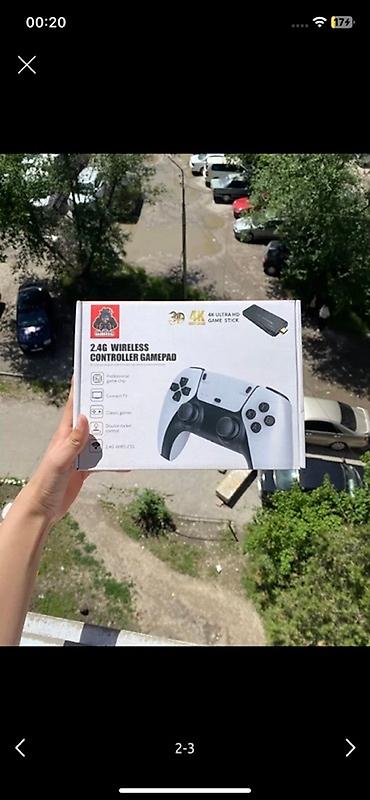 Ретро консоли: Игровая приставка Game Stick Lite M8S с двумя беспроводными геймпадами — 1