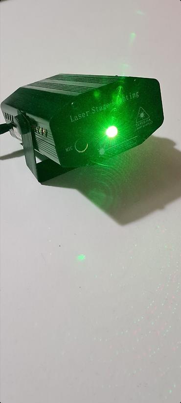 Projektori: - Mini Laser Stage Lighting najpopularniji light efekat. - Polovan — 2