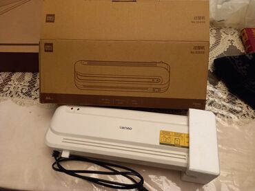 Printerlər: Laminator Deli 33939 . Yenidir. A4 formatına qədər laminasiya. Ölçüsü