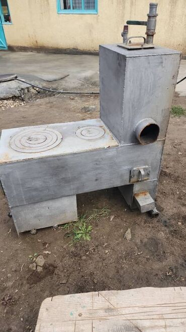 оборудование для пекарни бу цены: Металлическая твердотопливная печь-плита с варочной поверхностью -