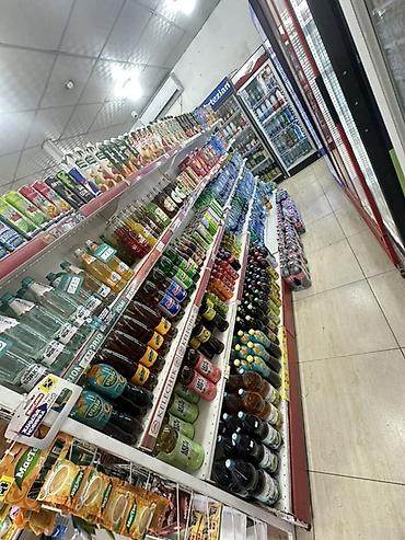 китайский орех: Продуктовый магазин с широким ассортиментом повседневных товаров. - — 1