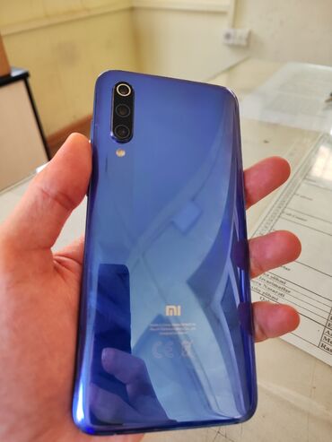 xiaomi mi s: Xiaomi Mi 9, 128 ГБ, цвет - Синий, 
 Отпечаток пальца, Face ID