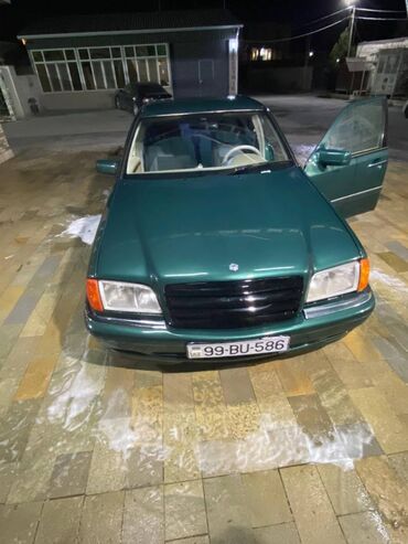 Mercedes-Benz: Mercedes-Benz 240: 2.4 l | 1998 il Sedan — 4