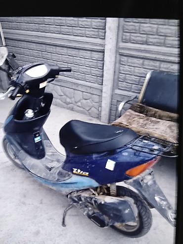 стартеры: Скутер Honda Dio (серия AF), цвет темно-синий. - Двигатель — 1
