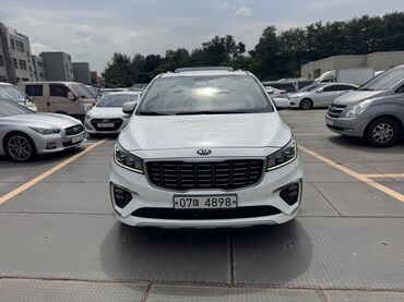 автомобиль самсунг: Kia Carnival (Sedona) — семейный минивэн белого цвета с корейскими