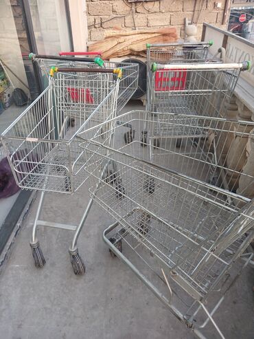 setka toxuyan aparat: Supermarket arabalari yaxsi vezyetdediler iclerinde boyuk olcude