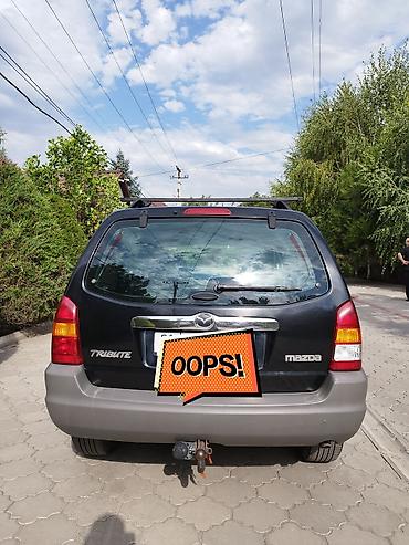 роторная косылка: Mazda Tribute: 2003 г., 2 л, Механика, Бензин, Кроссовер — 2