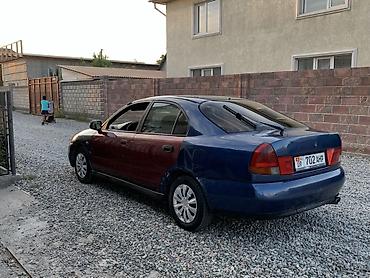 выхлопная: Mitsubishi Carisma: 1998 г., 1.8 л, Механика, Бензин, Седан — 2