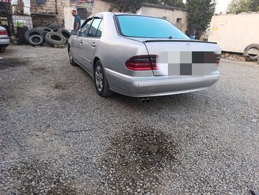 07 oturacaqları: Mercedes-Benz E-Class: 2.9 l | 1998 il Sedan