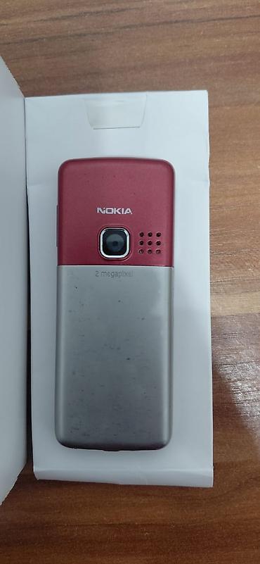 nokia n76: Nokia 6300 (RM‑217), красно‑серебристая версия. Классический кнопочный — 2