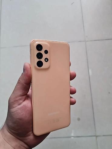 Мобильные телефоны: Samsung Galaxy A23, 64 ГБ, цвет - Розовый, Отпечаток пальца — 3