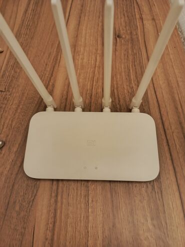 xiaomi modem: Xiaomi router/modem satilir. cox az istifade olunub. Yeni kimidir