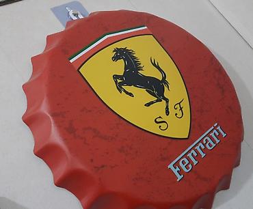 Ferrari: "Ferrari" yazılı, qapaq şəkilli metal lövhə. Yenidir. Diametri: 35sm — 3