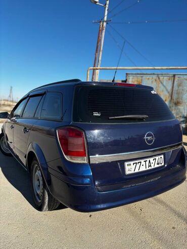 Opel: Opel Astra H Caravan (universal), göy rəng. - Kuzov: universal — 14
