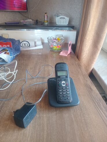 peyk anteni: Telefon 30 AZN vayfay aparati yenidir 40 AZN