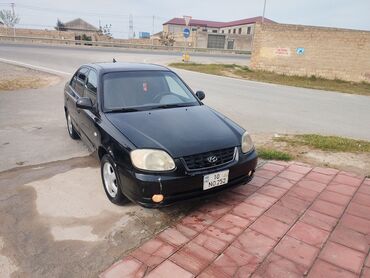 Hyundai Accent: 1.5 l | 2004 il Sedan