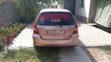 хонда фит жас: Автомобиль Honda Fit розового цвета с пятидверным кузовом хэтчбек
