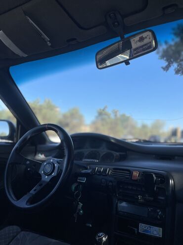 шины на масквич: Mazda Cronos: 1992 г., 2 л, Механика, Бензин, Седан