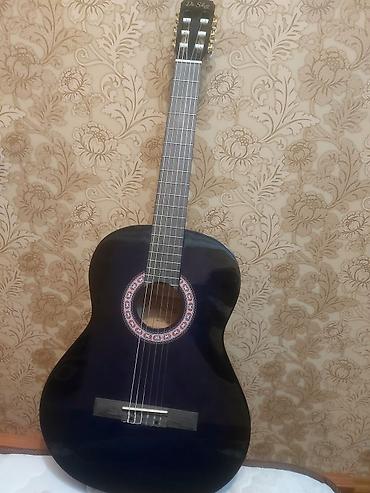 Klassik gitara – De Silva brendi Xüsusiyyətlər: - Korpus: tam ölçülü
