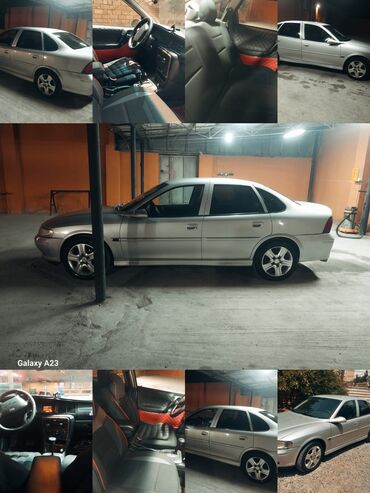 opel unversal: Opel Vectra: 2 l | 1998 il Sedan