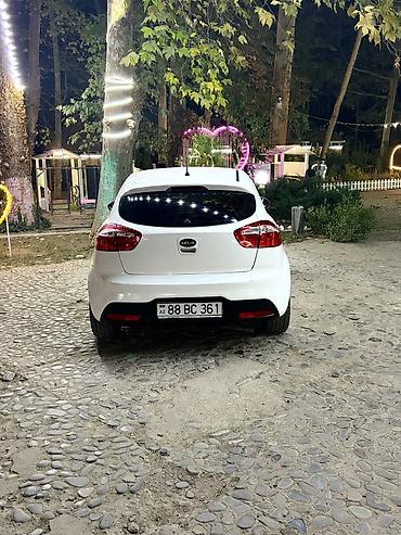 Kia: Kia Rio: 1.4 л | 2012 г. Хэтчбэк — 5