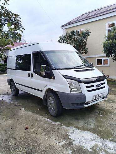 yer sumlayan traktor: Ford Transit: 2.4 l | 2006 il Van/Minivan — 2